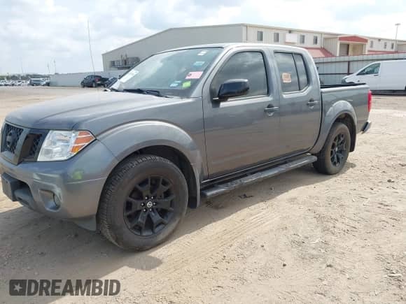 2020 Nissan Frontier SV with VIN 1N6ED0EA4LN727738, listed as a IAAI auction lot 43527003 with 94,663 mi miles and . Bid and sale history available at DreamBid. Image 2.