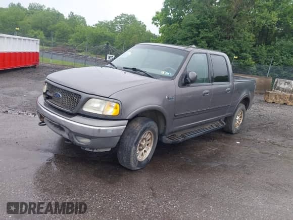 2003 Ford F-150 XLT with VIN 1FTRW08L53KC28864, listed as a IAAI auction lot 36640528 with 236,350 mi miles and . Bid and sale history available at DreamBid. Image 2.
