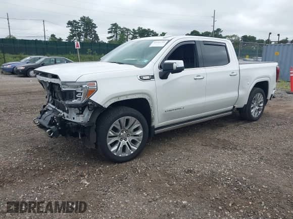 2020 GMC Sierra 1500 Denali z VIN 3GTU9FETXLG407742, wystawiony jako IAAI lot #42721745 z przebiegiem 38 609 mil mil oraz . Historia ofert i sprzedaży dostępna na DreamBid. Obrazek 18.