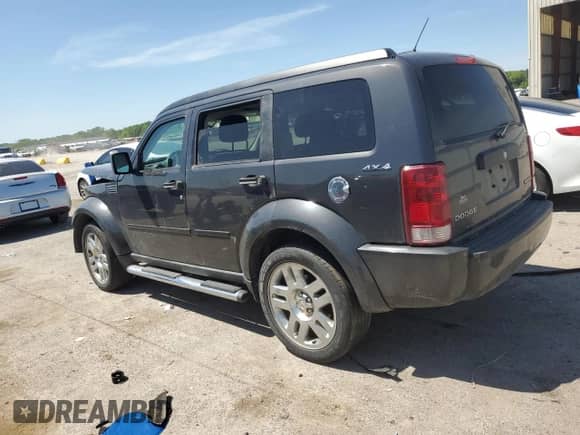 2011 Dodge Nitro Heat with VIN 1D4PU4GK3BW580980, listed as a Copart auction lot 56222595 with 231,178 mi miles and Salvage title. Bid and sale history available at DreamBid. Image 2.