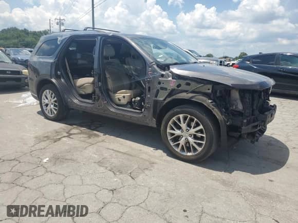 2015 Dodge Durango Citadel with VIN 1C4SDJETXFC870125, listed as a Copart auction lot 66403535 with 162,423 mi miles and Salvage title. Bid and sale history available at DreamBid. Image 4.