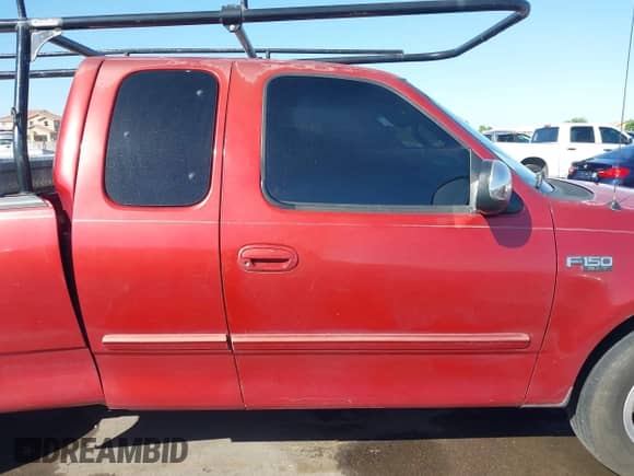 2000 Ford F-150 XL with VIN 1FTZX1726YKA06594, listed as a IAAI auction lot 43460075 with 232,103 mi miles and . Bid and sale history available at DreamBid. Image 13.