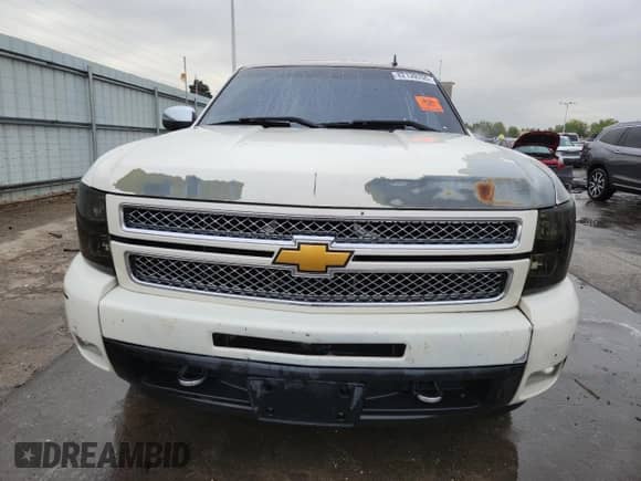 2013 Chevrolet Silverado 1500 LTZ with VIN 3GCPKTE72DG131724, listed as a Copart auction lot 82139705 with 183,083 mi miles and Salvage title. Bid and sale history available at DreamBid. Image 5.