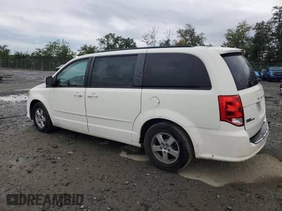 2012 Dodge Grand Caravan SXT with VIN 2C4RDGCG1CR154157, listed as a Copart auction lot 85591555 with 254,438 mi miles and Salvage title. Bid and sale history available at DreamBid. Image 2.