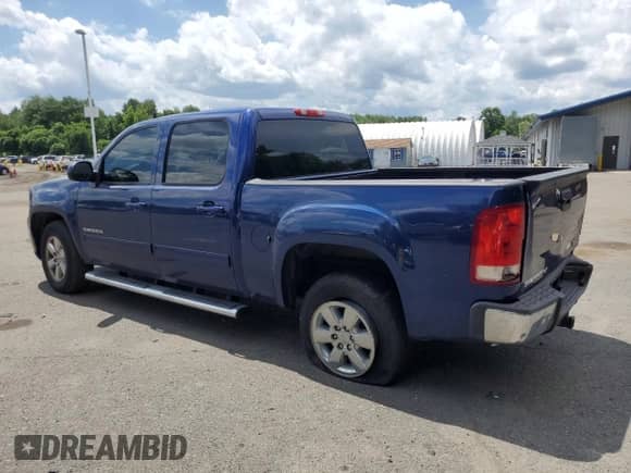 2013 GMC Sierra 1500 SLT with VIN 3GTP2WE77DG161822, listed as a Copart auction lot 63851855 with 169,146 mi miles and Salvage title. Bid and sale history available at DreamBid. Image 2.