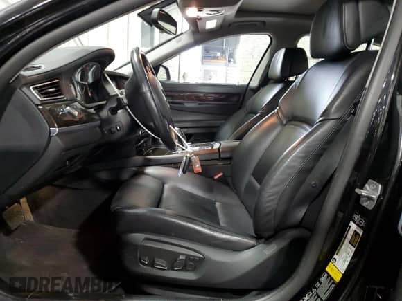 2013 BMW 7 Series 750i xDrive with VIN WBAYB6C59DD223852, listed as a Copart auction lot 49304695 with 124,989 mi miles and Salvage title. Bid and sale history available at DreamBid. Image 7.