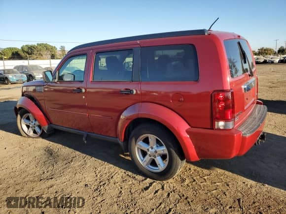 2007 Dodge Nitro SLT с VIN 1D8GU58K37W586952, выставлен на аукционе Copart как лот 77903234 с пробегом 144 568 миль миль и Списание • Salvage title. История ставок и продаж доступна на DreamBid. Изображение 2.
