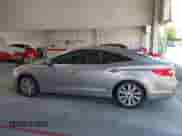 2013 Hyundai Azera с VIN KMHFH4JG7DA262096, выставлен на аукционе IAAI как лот 43018782 с пробегом 21 178 миль миль и . История ставок и продаж доступна на DreamBid. Изображение 14.