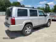 2010 Jeep Commander Sport with VIN 1J4RG4GK5AC121781, listed as a Copart auction lot 59873605 with 159,444 mi miles and Salvage title. Bid and sale history available at DreamBid. Image 3.