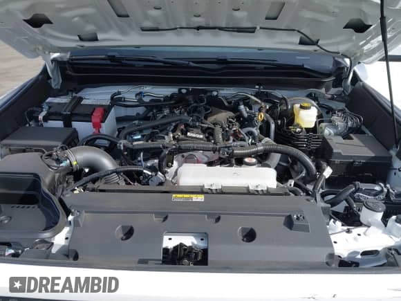 2024 Toyota Tacoma SR5 z VIN 3TMKB5FN5RM022914, wystawiony jako IAAI lot #41398168 z przebiegiem 2 535 mil mil oraz . Historia ofert i sprzedaży dostępna na DreamBid. Obrazek 9.