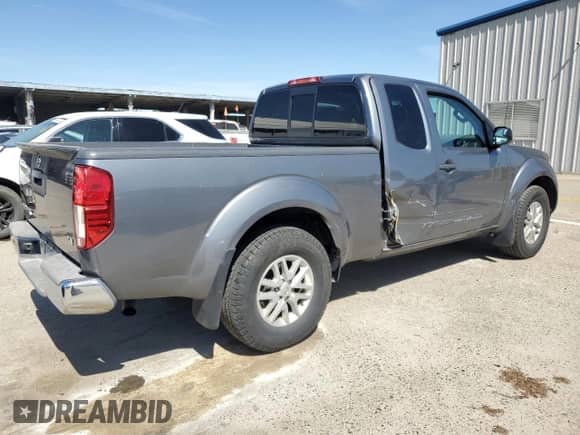 2019 Nissan Frontier SV with VIN 1N6AD0CU0KN750699, listed as a Copart auction lot 57166005 with 74,705 mi miles and Salvage title. Bid and sale history available at DreamBid. Image 3.
