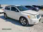 2010 Dodge Caliber SXT with VIN 1B3CB4HA2AD533460, listed as a Copart auction lot 71959205 with 159,235 mi miles and Salvage title. Bid and sale history available at DreamBid. Image 4.