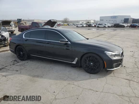 2017 BMW 7 Series 740i xDrive with VIN WBA7E4C56HGU99739, listed as a Copart auction lot 45713695 with 118,349 mi miles and Salvage title. Bid and sale history available at DreamBid. Image 4.