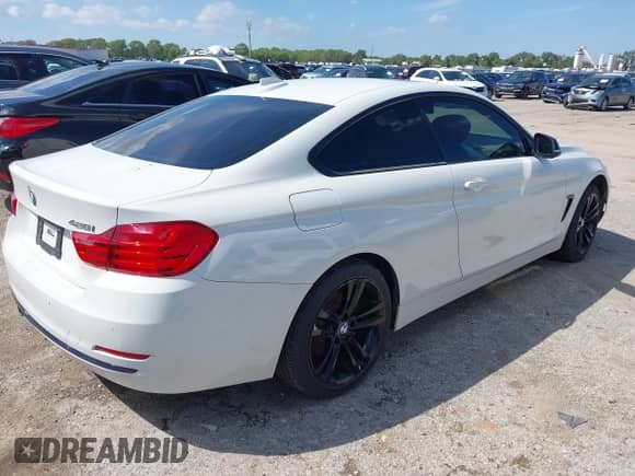 2015 BMW 4 Series 428i с VIN WBA3N3C52FK233864, выставлен на аукционе IAAI как лот 43268011 с пробегом 95 724 миль миль и . История ставок и продаж доступна на DreamBid. Изображение 4.