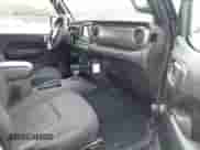 2022 Jeep Wrangler Unlimited Willys with VIN 1C4HJXDN9NW133603, listed as a IAAI auction lot 43196013 with 71,832 mi miles and . Bid and sale history available at DreamBid. Image 5.