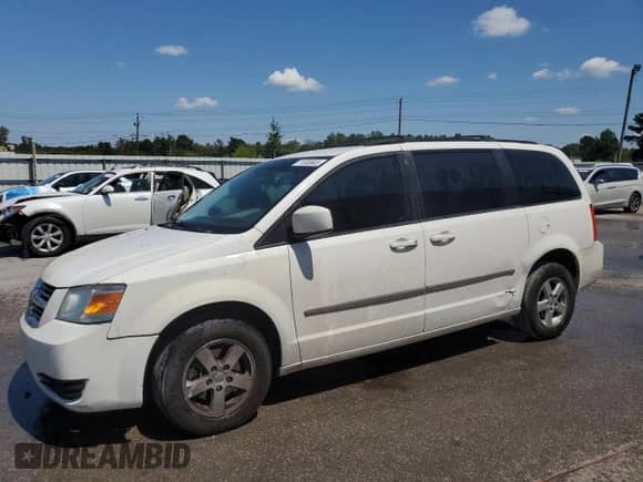 2010 Dodge Grand Caravan SXT with VIN 2D4RN5D10AR460200, listed as a Copart auction lot 71303905 with 172,308 mi miles and Salvage title. Bid and sale history available at DreamBid. Image 1.