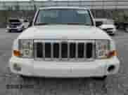 2007 Jeep Commander Sport z VIN 1J8HG48K57C662511, wystawiony jako Copart lot #66227155 z przebiegiem 170 649 mil mil oraz Szkoda całkowita • Salvage title. Historia ofert i sprzedaży dostępna na DreamBid. Obrazek 5.