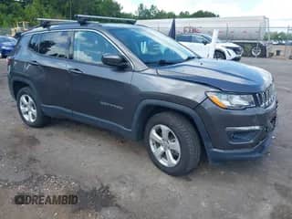 2021 Jeep Compass Latitude with VIN 3C4NJDBB3MT572102, listed as a IAAI auction lot 42648344 with 66,933 mi miles and . Bid and sale history available at DreamBid. Image 1.