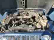 1999 Jeep Wrangler Sport with VIN 1J4FY19S1XP455674, listed as a Copart auction lot 86821605 with 218,356 mi miles and Clean title. Bid and sale history available at DreamBid. Image 11.