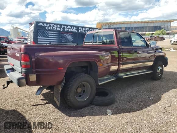 2001 Dodge 3500 with VIN 1B7MF33651J244711, listed as a Copart auction lot 68735784 with 253,795 mi miles and Salvage title. Bid and sale history available at DreamBid. Image 3.