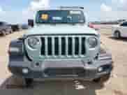 2023 Jeep Wrangler Sport with VIN 1C4HJXAG2PW650279, listed as a Copart auction lot 65038835 with 10,349 mi miles and Salvage title. Bid and sale history available at DreamBid. Image 5.
