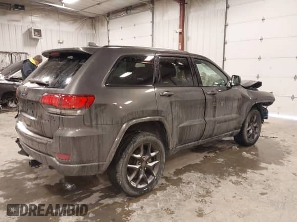2021 Jeep Grand Cherokee 80th Anniversary z VIN 1C4RJFBG2MC736010, wystawiony jako IAAI lot #41355729 z przebiegiem 45 588 mil mil oraz . Historia ofert i sprzedaży dostępna na DreamBid. Obrazek 4.