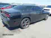 2013 Dodge Challenger SXT with VIN 2C3CDYAG9DH708717, listed as a IAAI auction lot 41990705 with 92,784 mi miles and . Bid and sale history available at DreamBid. Image 4.