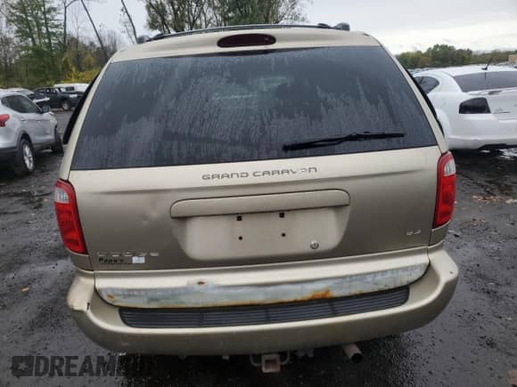 2002 Dodge Caravan ES with VIN 2B4GP54L12R581347, listed as a Copart auction lot 84217165 with 242,303 mi miles and Salvage title. Bid and sale history available at DreamBid. Image 6.
