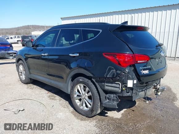 2017 Hyundai Santa Fe 2.0T с VIN 5NMZUDLA4HH039547, выставлен на аукционе IAAI как лот 41740744 с пробегом 122 641 миль миль и . История ставок и продаж доступна на DreamBid. Изображение 3.