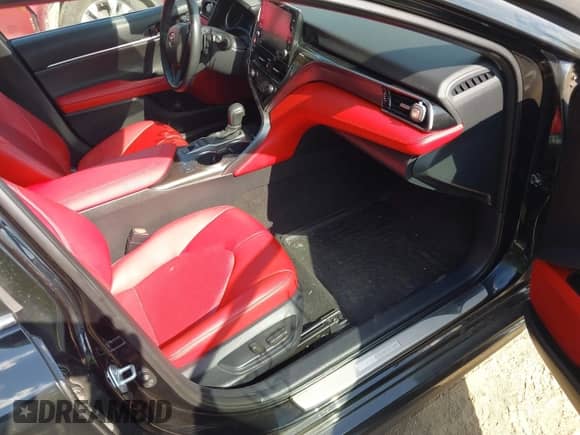 2023 Toyota Camry XSE with VIN 4T1K61AK3PU100136, listed as a IAAI auction lot 43222647 with 77,489 mi miles and . Bid and sale history available at DreamBid. Image 5.