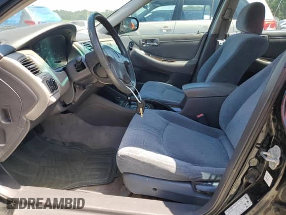 1999 Honda Accord EX с VIN 1HGCG1658XA028099, выставлен на аукционе Copart как лот 70496855 с пробегом Не указан миль и Списание • Salvage title. История ставок и продаж доступна на DreamBid. Изображение 7.