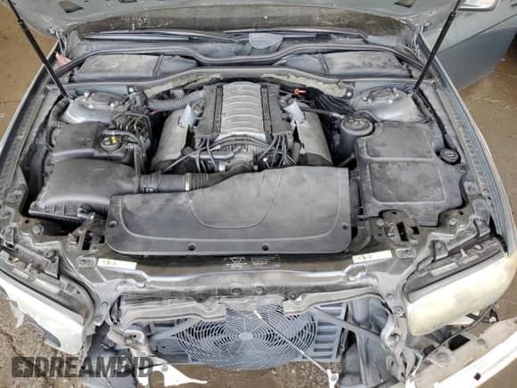 2002 BMW 7 Series 745Li with VIN WBAGN63472DR04910, listed as a Copart auction lot 84754005 with 140,016 mi miles and Salvage title. Bid and sale history available at DreamBid. Image 11.