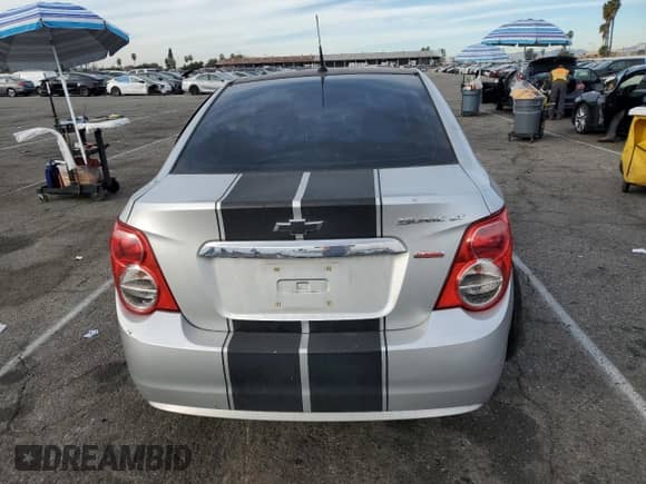 2012 Chevrolet Sonic LT z VIN 1G1JD5SB5C4180537, wystawiony jako Copart lot #86329704 z przebiegiem 134 506 mil mil oraz Szkoda całkowita • Salvage title. Historia ofert i sprzedaży dostępna na DreamBid. Obrazek 6.