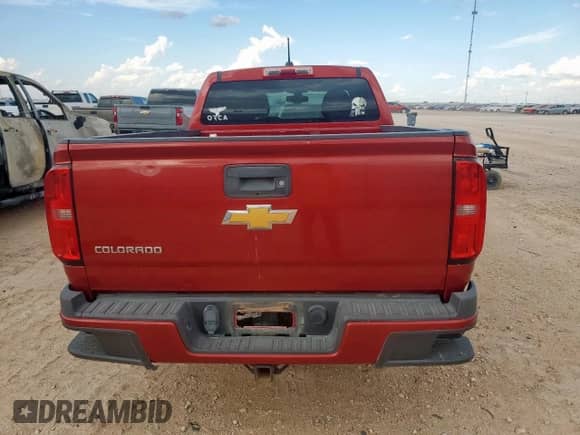 2015 Chevrolet Colorado 2WD Z71 with VIN 1GCGSCE38F1134111, listed as a Copart auction lot 65525045 with 114,283 mi miles and Salvage title. Bid and sale history available at DreamBid. Image 6.