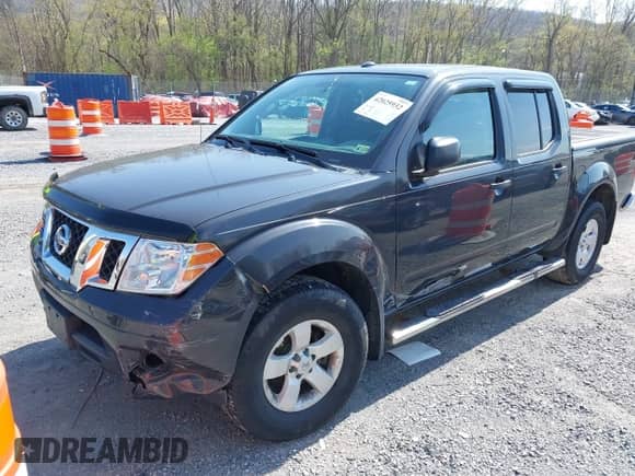 2013 Nissan Frontier SL with VIN 1N6AD0EVXDN713877, listed as a IAAI auction lot 42025932 with Not provided miles and . Bid and sale history available at DreamBid. Image 2.