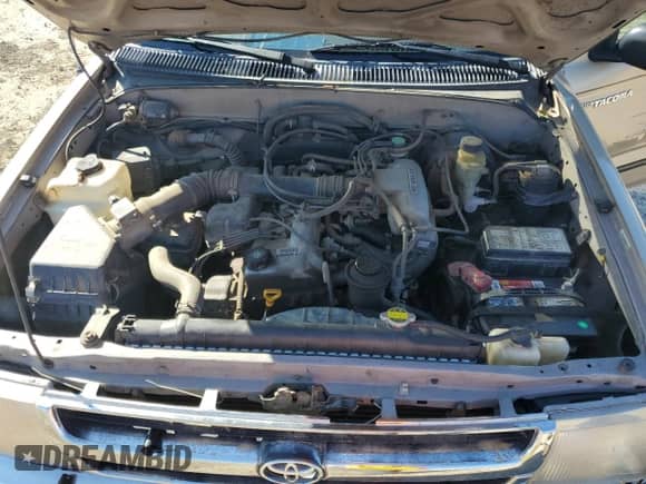 1997 Toyota Tacoma z VIN 4TAVL52NXVZ305250, wystawiony jako Copart lot #81581705 z przebiegiem 208 969 mil mil oraz Szkoda całkowita • Salvage title. Historia ofert i sprzedaży dostępna na DreamBid. Obrazek 11.