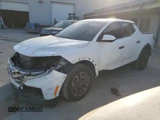 2024 Hyundai Santa Cruz SE с VIN 5NTJA4DE5RH115757, выставлен на аукционе Copart как лот 87914275 с пробегом 11 303 миль миль и На запчасти • Non repairable. История ставок и продаж доступна на DreamBid. Изображение 1.