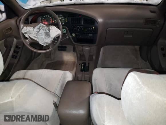 1993 Toyota Camry с VIN 4T1SK13E6PU264838, выставлен на аукционе Copart как лот 41651745 с пробегом 89 537 миль миль и Списание • Salvage title. История ставок и продаж доступна на DreamBid. Изображение 8.