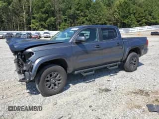 2022 Toyota Tacoma SR5 with VIN 3TMAZ5CN5NM189053, listed as a Copart auction lot 71204865 with 11,042 mi miles and Salvage title. Bid and sale history available at DreamBid. Image 1.