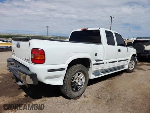 2003 GMC Sierra 1500 SLT with VIN 1GTEK19T03Z289870, listed as a Copart auction lot 71614465 with 214,694 mi miles and Salvage title. Bid and sale history available at DreamBid. Image 3.