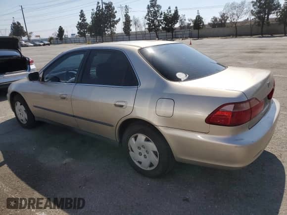 2000 Honda Accord LX с VIN 1HGCG1643YA089899, выставлен на аукционе Copart как лот 54937555 с пробегом 196 596 миль миль и Списание • Salvage title. История ставок и продаж доступна на DreamBid. Изображение 2.