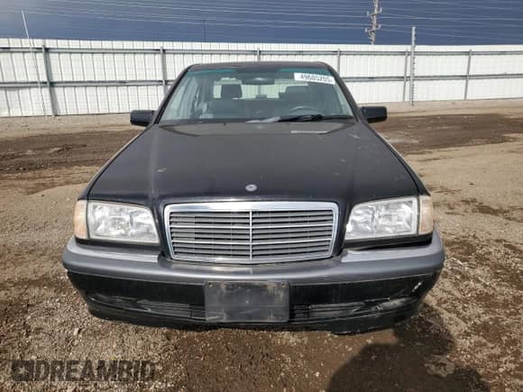 1999 Mercedes-Benz C 230/260/280/320 z VIN WDBHA24G9XA716840, wystawiony jako Copart lot #49605205 z przebiegiem 56 535 mil mil oraz Czysty tytuł • Clean title. Historia ofert i sprzedaży dostępna na DreamBid. Obrazek 5.