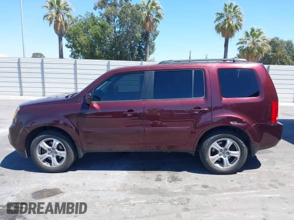 2014 Honda Pilot EX-L with VIN 5FNYF3H5XEB009008, listed as a IAAI auction lot 43024881 with 119,646 mi miles and . Bid and sale history available at DreamBid. Image 14.