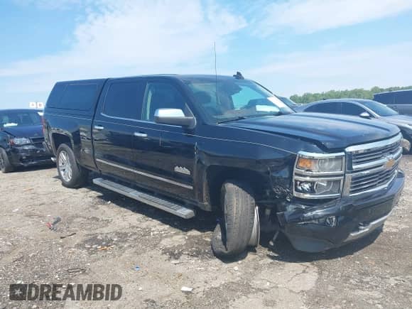 2015 Chevrolet Silverado 1500 High Country z VIN 3GCPCTEC7FG385328, wystawiony jako IAAI lot #43036924 z przebiegiem 155 391 mil mil oraz . Historia ofert i sprzedaży dostępna na DreamBid. Obrazek 1.