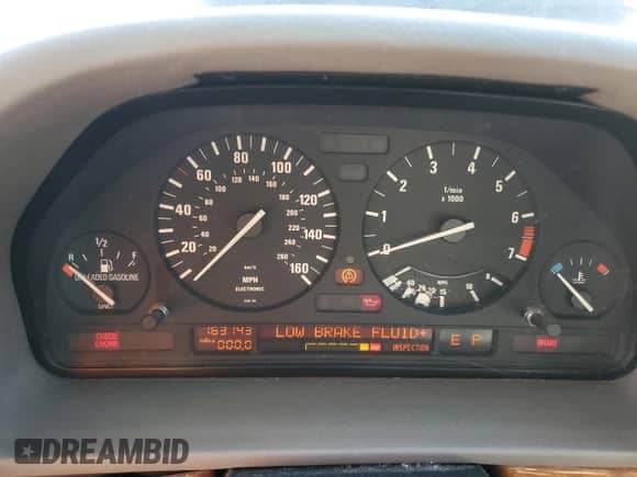 1993 BMW 7 Series with VIN WBAGD832XPDE85801, listed as a Copart auction lot 77111624 with 163,143 mi miles and Clean title. Bid and sale history available at DreamBid. Image 9.