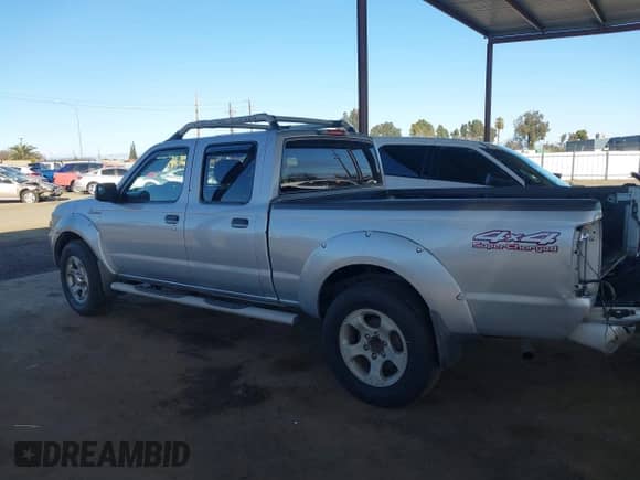 2003 Nissan Frontier SVE with VIN 1N6MD29Y63C465571, listed as a IAAI auction lot 41502613 with 175,996 mi miles and . Bid and sale history available at DreamBid. Image 15.