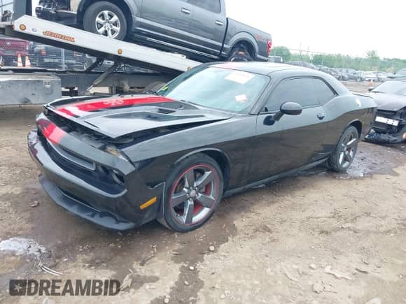 2013 Dodge Challenger SXT with VIN 2C3CDYAG1DH581784, listed as a IAAI auction lot 42263476 with 107,341 mi miles and . Bid and sale history available at DreamBid. Image 2.