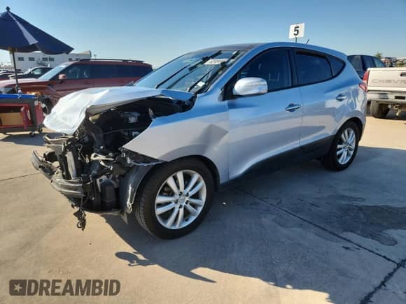 2013 Hyundai Tucson Limited with VIN KM8JU3AC2DU603920, listed as a Copart auction lot 82494405 with 115,949 mi miles and Salvage title. Bid and sale history available at DreamBid. Image 1.