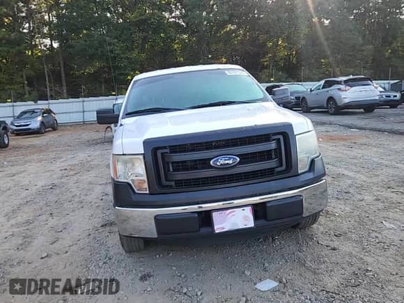 2014 Ford F-150 XL with VIN 1FTEX1CM7EKG36822, listed as a Copart auction lot 82197335 with 184,300 mi miles and Salvage title. Bid and sale history available at DreamBid. Image 13.