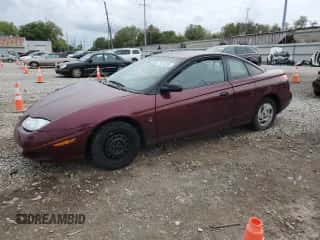 2002 Saturn SC с VIN 1G8ZP12892Z239888, выставлен на аукционе Copart как лот 72613284 с пробегом 130 138 миль миль и Списание • Salvage title. История ставок и продаж доступна на DreamBid. Изображение 1.